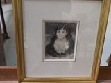a picture of a picture of a woman in a gold frame