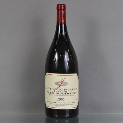 a bottle of wine that is sitting on a table
