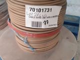 a roll of cable on a pallet with a price tag on it