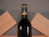 a bottle of wine that is sitting on a table