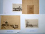 four old black and white photographs of people on a beach