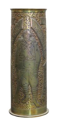 a gold vase with a picture of a man on it