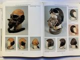 a book with pictures of helmets and helmets on it