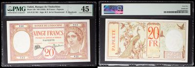 three different types of currency are on display in a display case