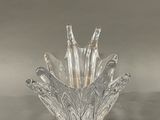 a glass vase that is sitting on a table