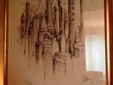 drawing of a picture of a city in a frame on a wall