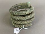 a coil of rope on a table with a tag on it