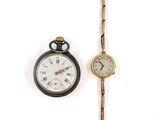 two different types of watches on a white surface