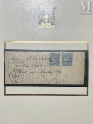 an old envelope with a stamp on it sitting on a table