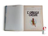 an open book with a picture of a bird on it