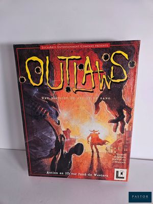 La boîte du jeu de société « Outlaws » est posée sur une table.