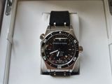 a watch that is sitting in a box on a table
