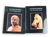 two books that are sitting on a white surface