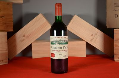 a bottle of wine that is sitting on a table