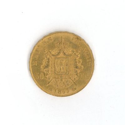 a gold coin with a coat of arms on it