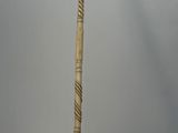 a cane that is standing up on a table