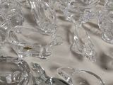 a lot of clear glass pieces on a table