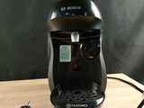 a coffee maker that is sitting on a table
