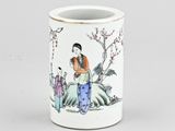 an image of a white cup with a painting of a woman on it