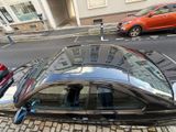 a car that is parked on the side of the street
