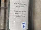 a roll of green wire wrapped in plastic
