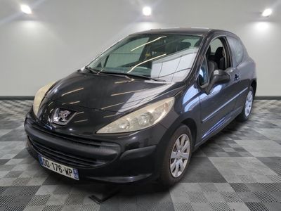 a picture of a black car parked in a garage