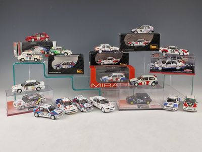 a lot of toy cars that are in a display case