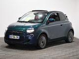 a picture of a small blue car parked in a room
