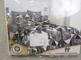 a picture of a bed in a box on the floor