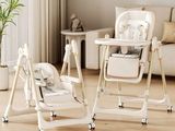 a baby high chair and a baby highchair in a living room