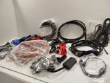 a table with a lot of cables and wires on it