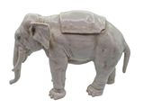 statue of an elephant with a saddle on its back