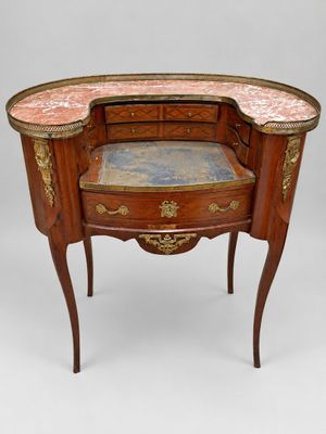 an image of a small wooden table with a marble top