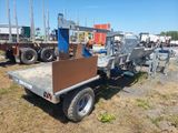 an image of a flatbed truck with a crane on the back