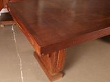 a large wooden table in the middle of a room