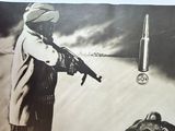 a picture of a man holding a gun next to a bullet
