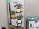 a box with a plant in it sitting on a table