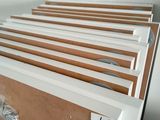 a lot of folders that are hanging on the wall