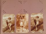 an old photo of a young girl holding a baseball bat