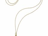 un collier plaqué or avec un pendentif en pierre bleue et une chaîne en or