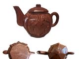 trois morceaux de chocolat en forme de théière