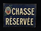 a sign that says chasse reserve on it