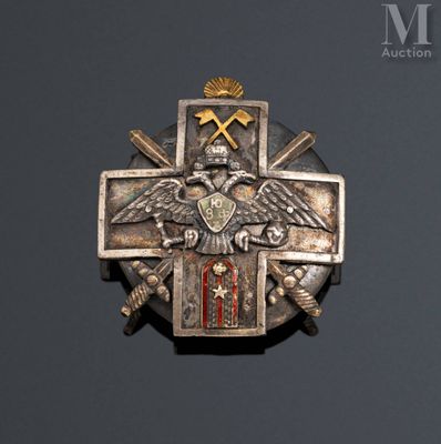 an image of a metal cross with a cross on it
