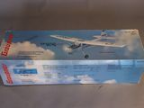 a box with a model of a small plane in it