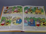 an open book with pictures of different animals in it