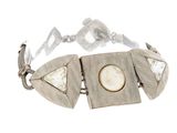 silver bracelet with mother of pearl and mother of pearl in center