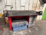 a workbench with a bench top and a tool box