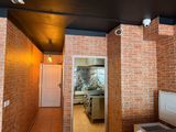 a bathroom with a toilet and a sink in it