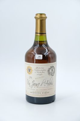 an image of a bottle of wine sitting on top of a table
