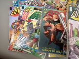 a lot of comic books sitting on a table